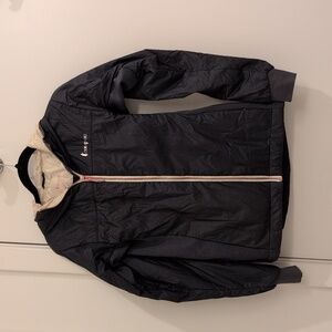 Cotopaxi insulated jacket. Nilon shell